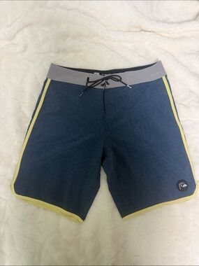 Quiksilver Navy Boardshorts with Yellow Trim